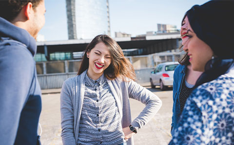 Young people together smiling