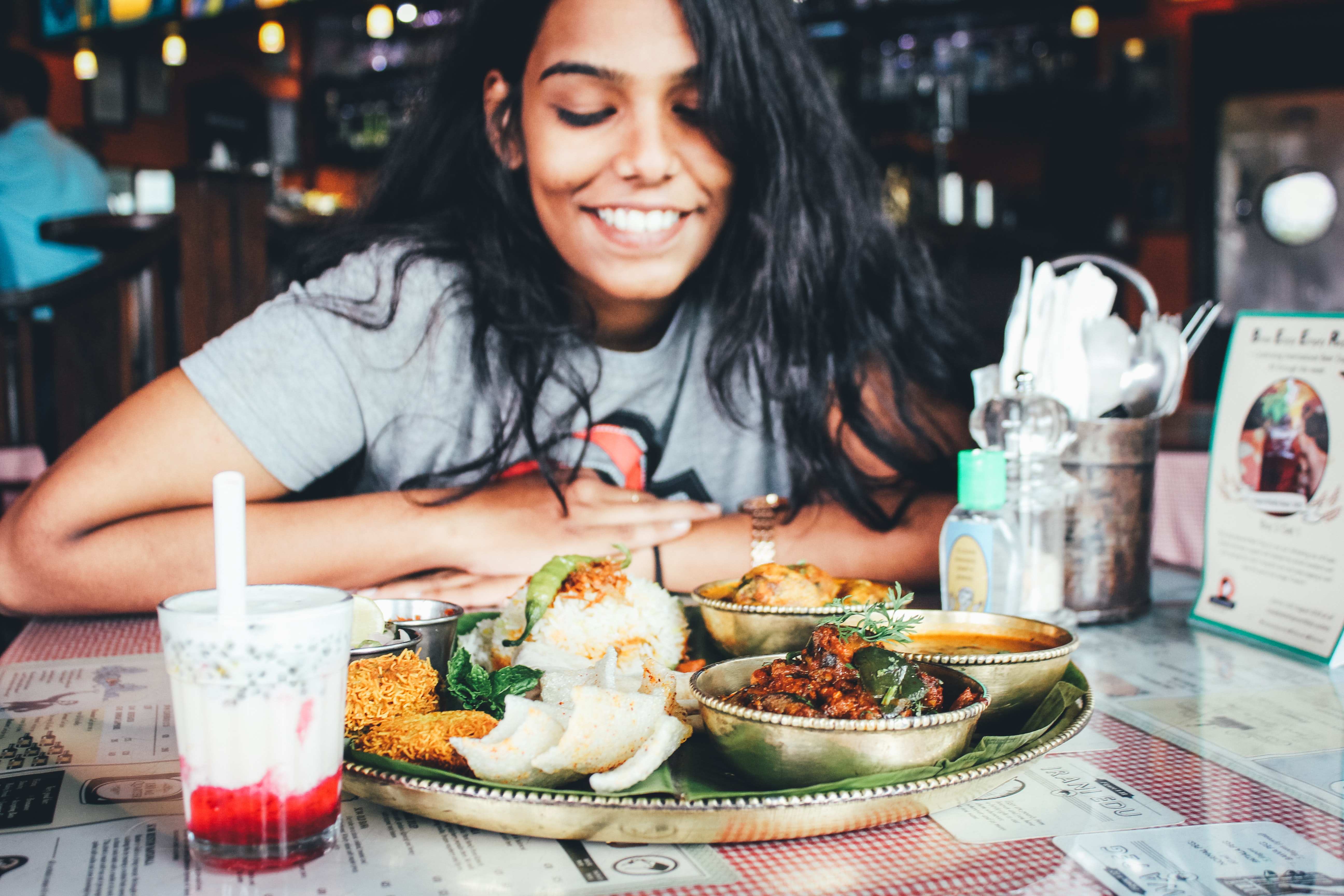 Teenager with plate of food.