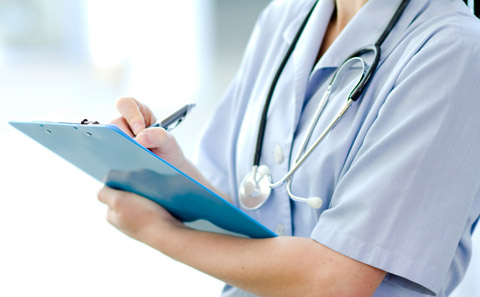 Nurse in uniform with clipboard