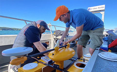 Dr Hachem Kassem and Dr Julian Leyland on board with picoCAT, autonomous surface vehicle (ASV)