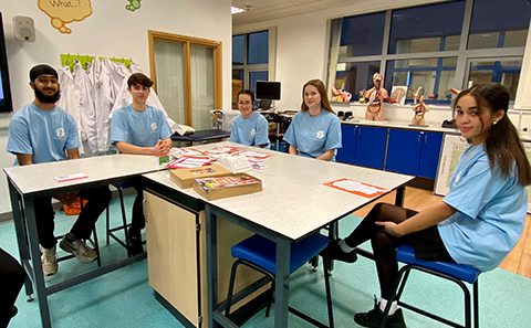Group of teenagers in blue T-shirts