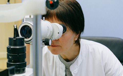 ophthalmologist and lamp microscope