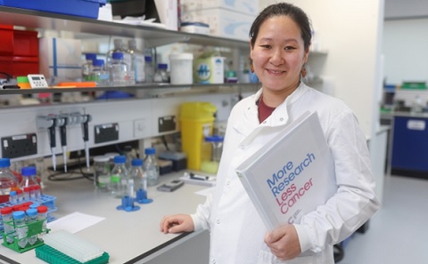 Woman researcher wearing a lab coat