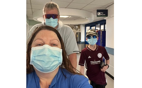 In hospital with family