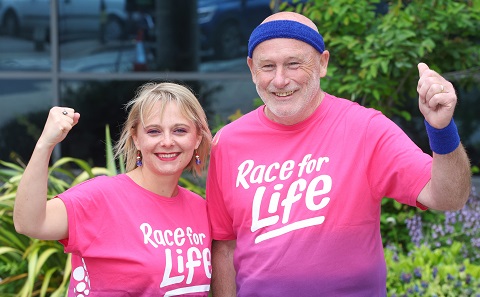 Two people in Race for Life T-shirts