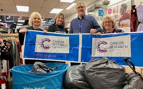 SCTU donate items to CRUK