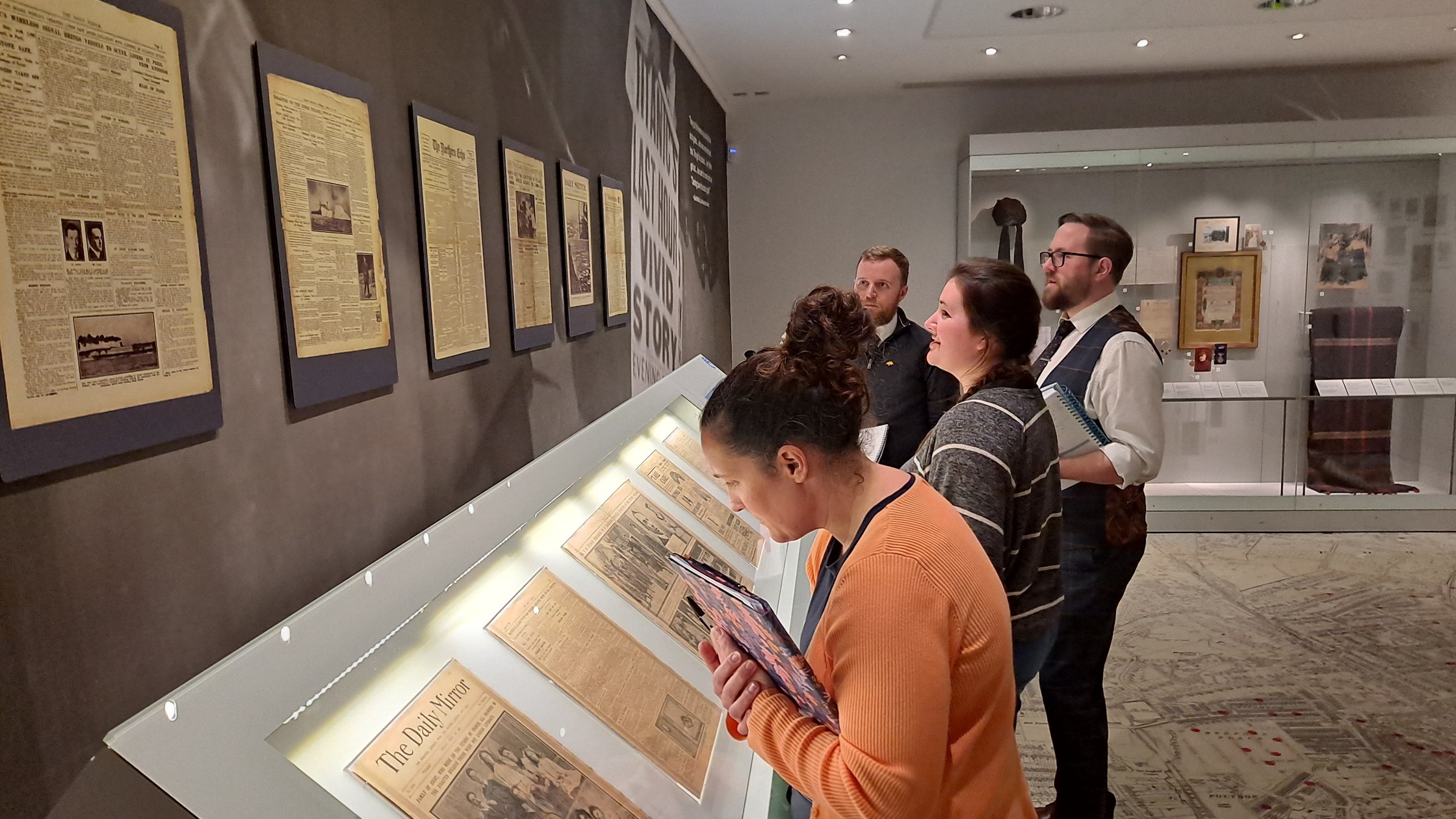 People looking at museum displays