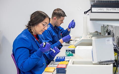 Researchers in lab