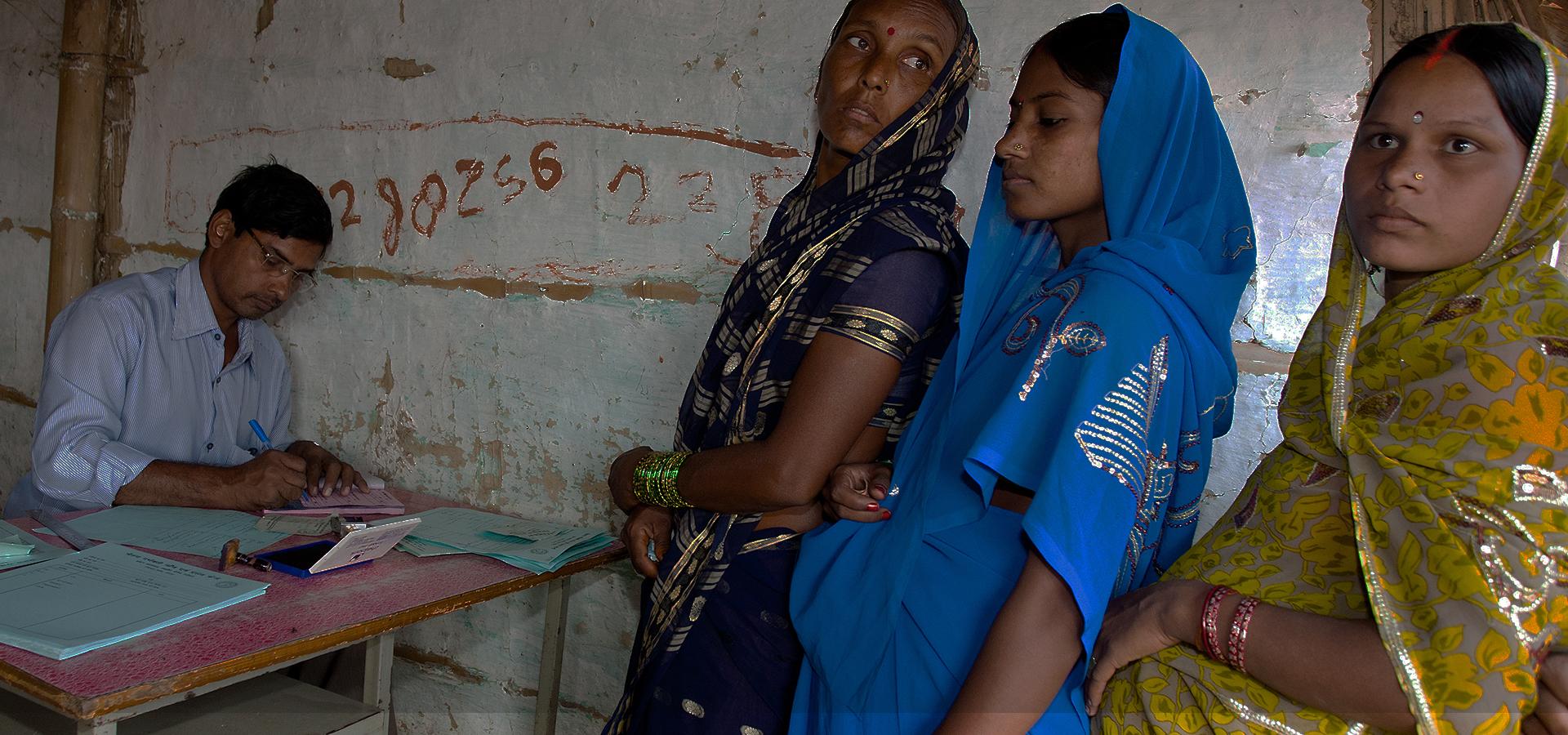 Three women queuing