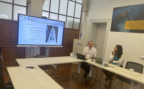 Two lecturers presenting in a classroom