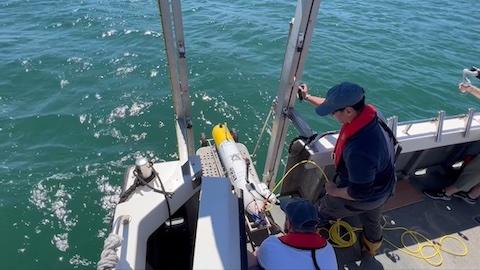Researchers deploying Smarty200 autonomous underwater vessel (AUV)