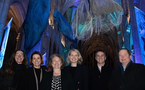 The SMMI team beneath Tessa Campbell Fraser’s whale sculptures at the Ocean Giants event