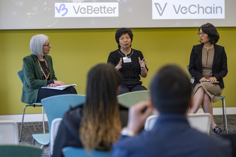 Presenters in discussion