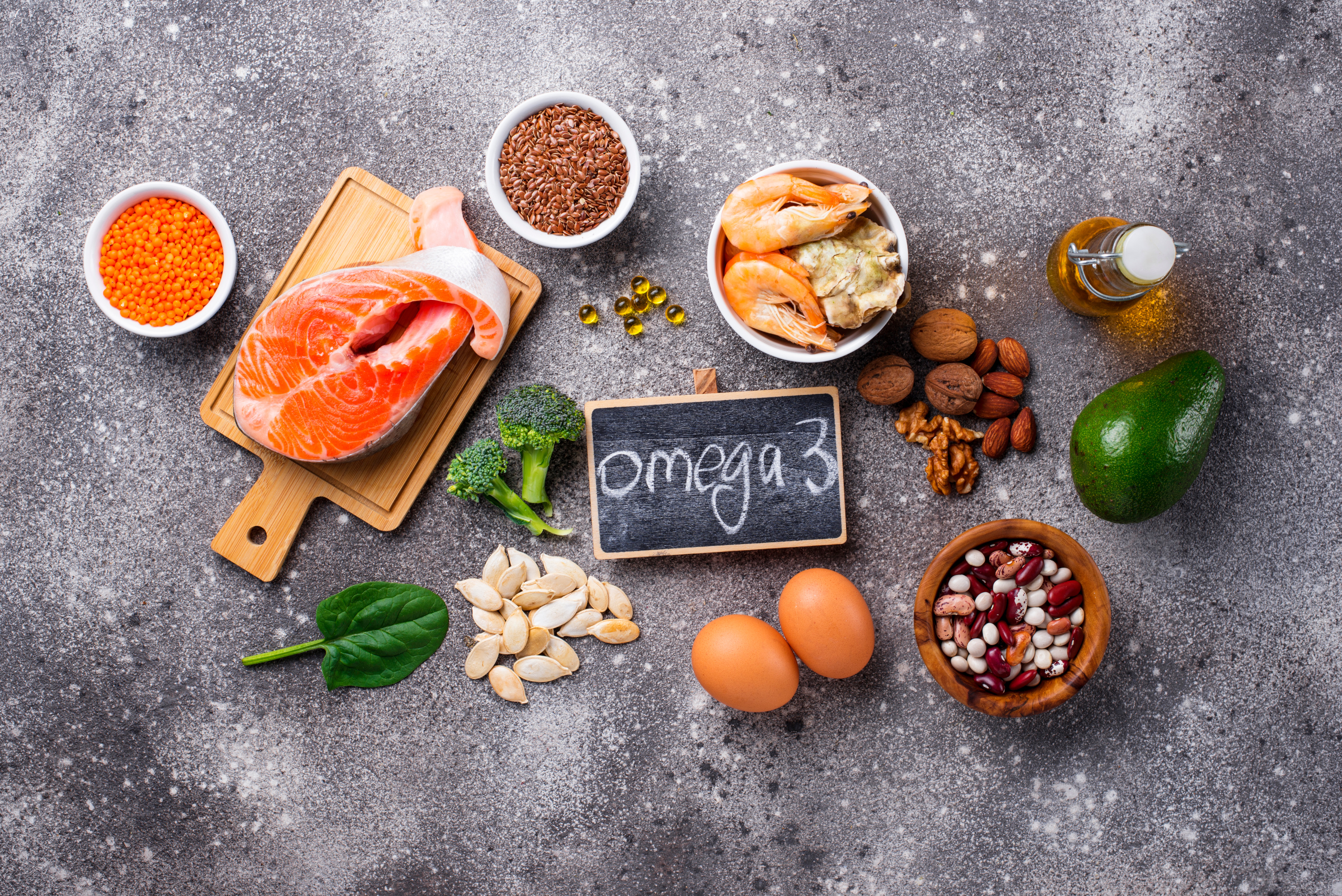 Omega-3 found in fish, nuts and eggs laid on table