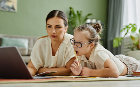 Image of parent and child learning