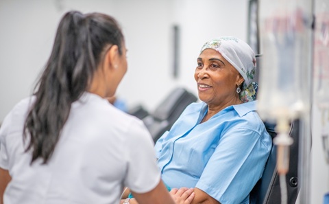 A cancer patient with a nurse