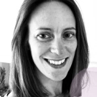 A black and white headshot image of Dr Chloe Grimmett