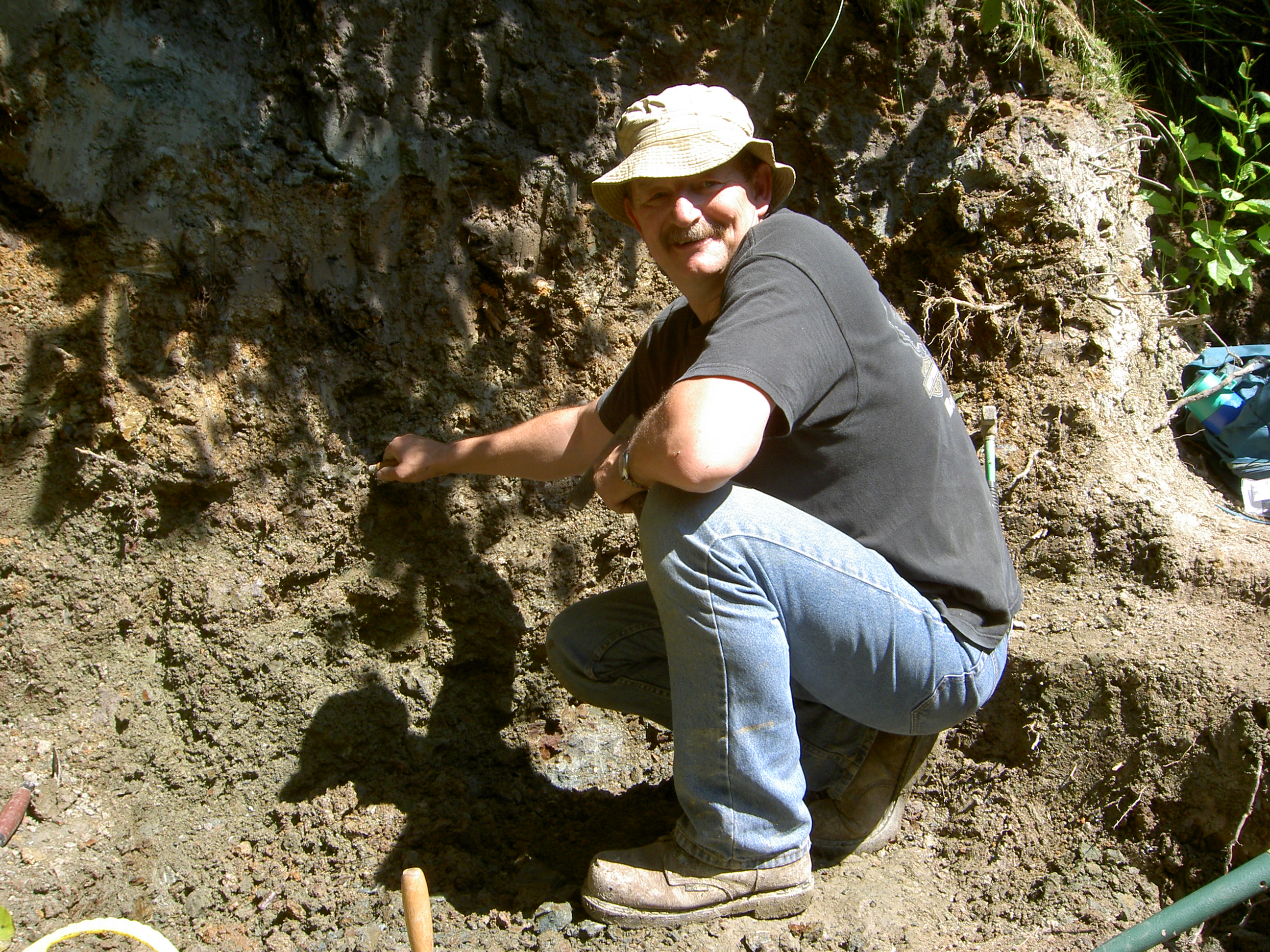 Dave Brockhurst at the site where the tyrannosaur and raptor teeth were discovered.