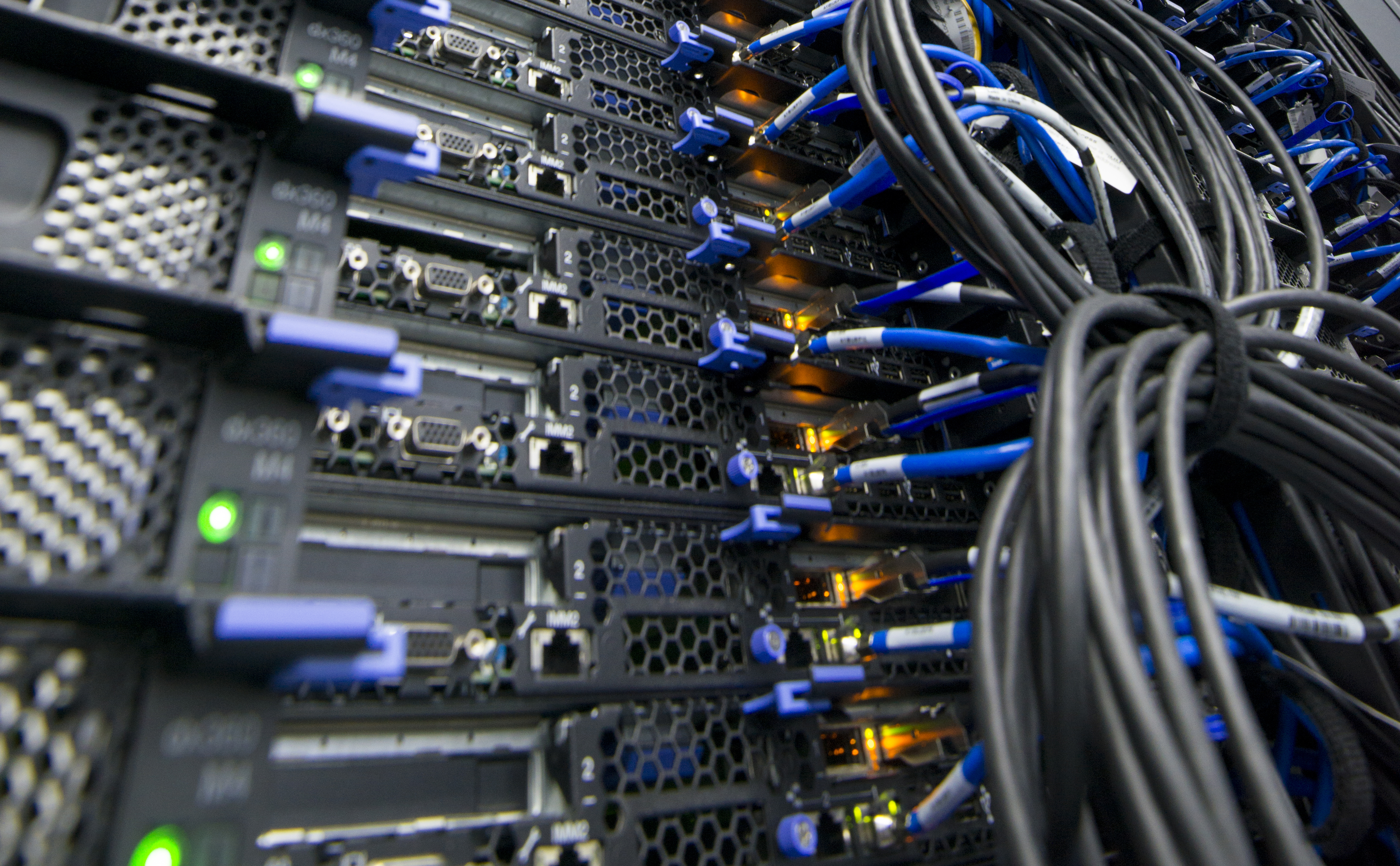 Computer hard drive with sockets and blue wires