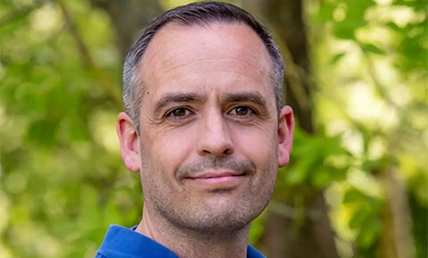 Professor Julian Leyland headshot looking at camera.