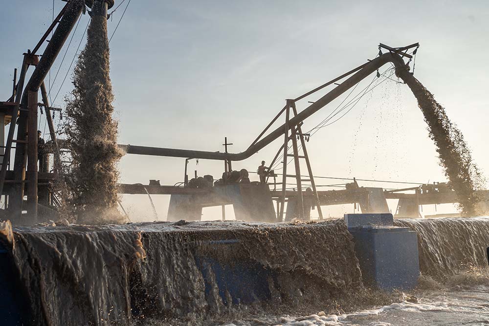 Sand mining barges extract sand from the Mekong, a river that supports the livelihoods of an estimated 60 million people in the region.