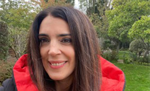 Mari Carmen Portillo smiling at camera.