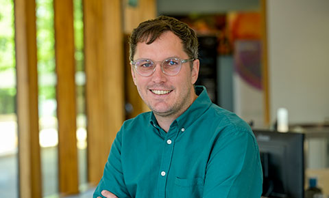 Professor Owen Rackham looking at camera.