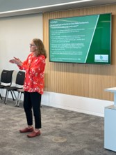 Sheena presenting the topics of challenges and barriers for discussion.