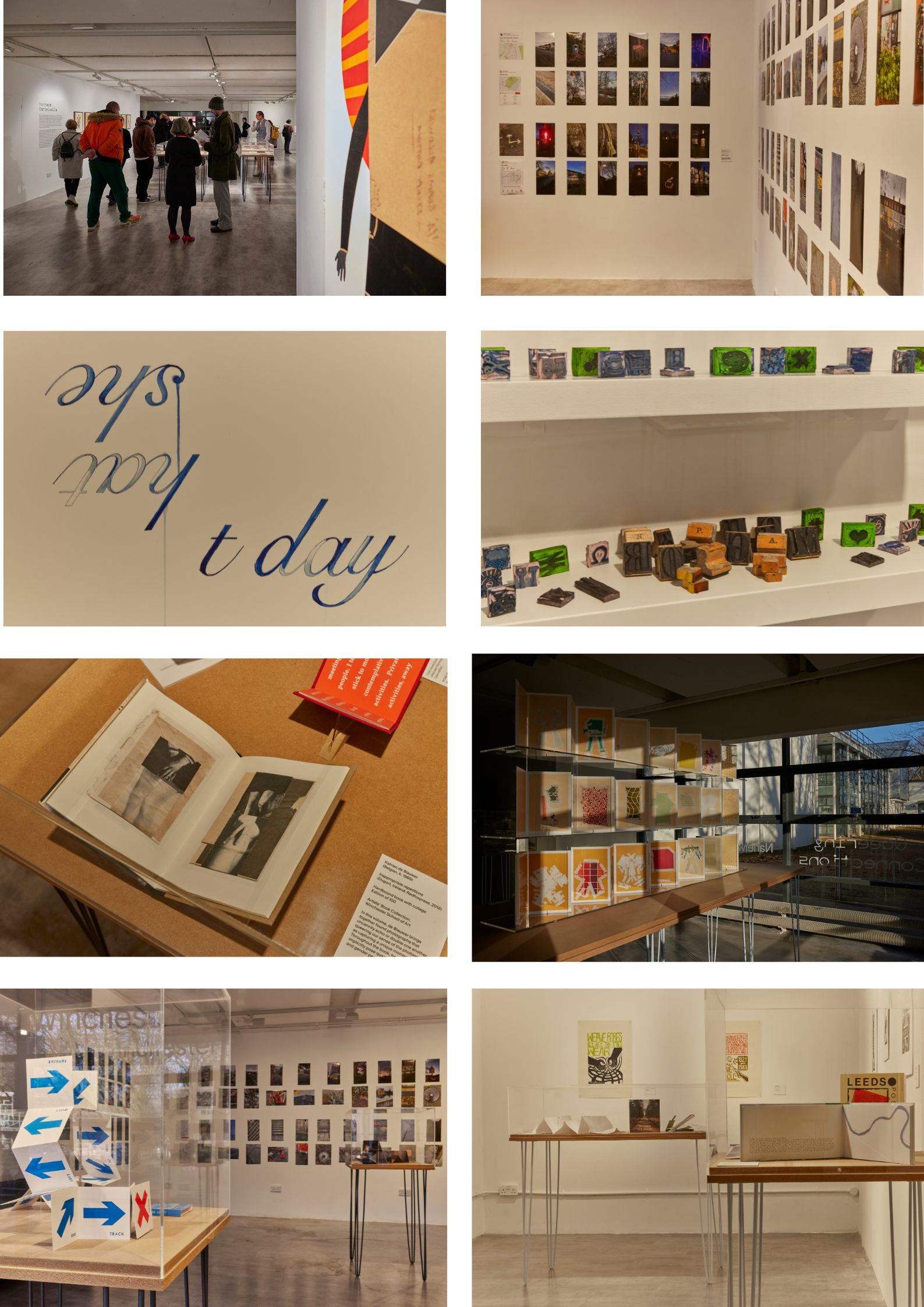 An art exhibition showcasing a variety of media, including photography, sculptures, books, and graphic art. Visitors walk through a gallery with walls adorned with photo series, while displays feature small sculptures, printed materials, and interactive pieces, with some text-based art and typography visible on the walls.