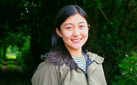 Picture of Rebecca staff member in grey coat