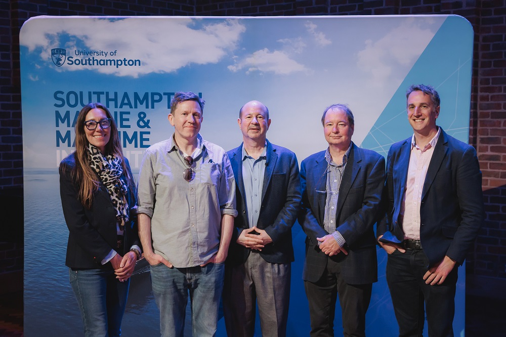 Michael Mann (centre) with Gavin Foster (to his left) and the SMMI Directors