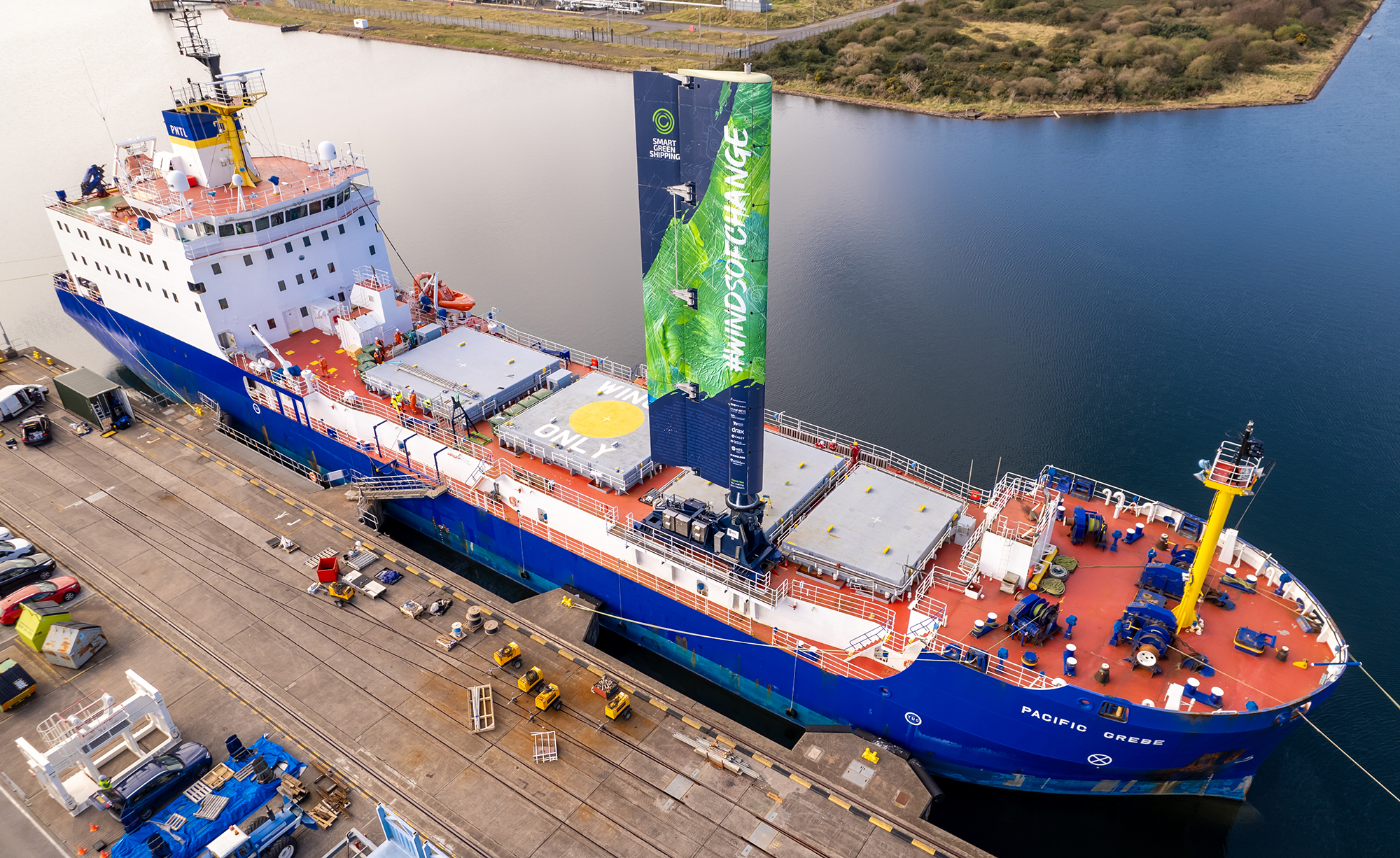 Pacific Grebe ship in dock with wing-sail raised