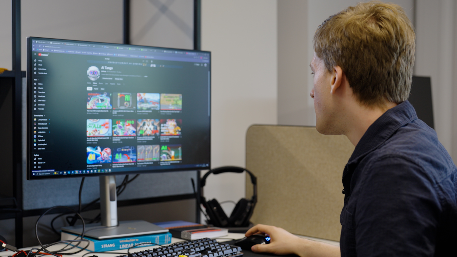 A person sitting in front of a computer coding a video game.