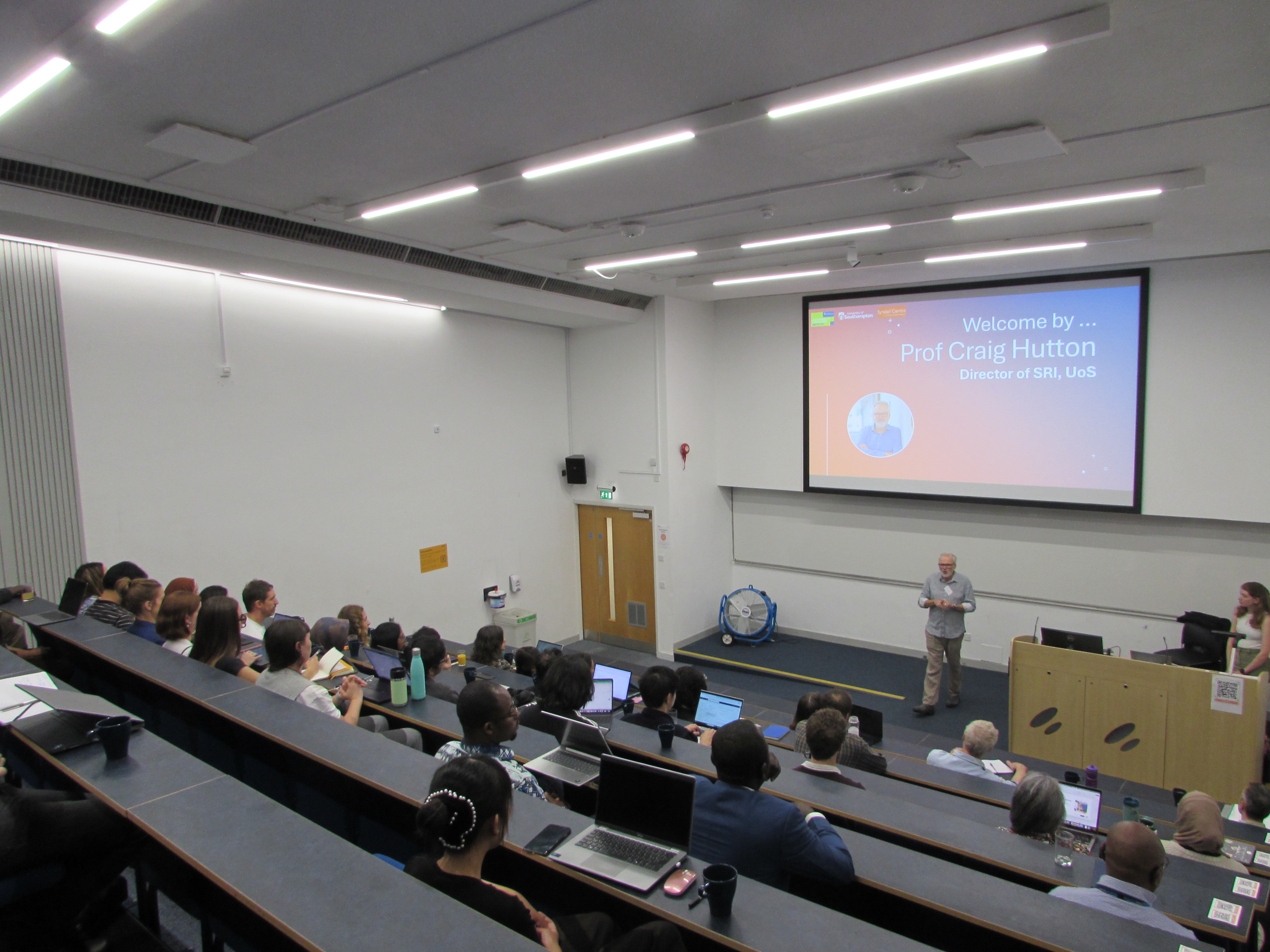 Professor Craig Hutton delivering the opening presentation at the 2026 Tyndall Centre Annual Assembly.