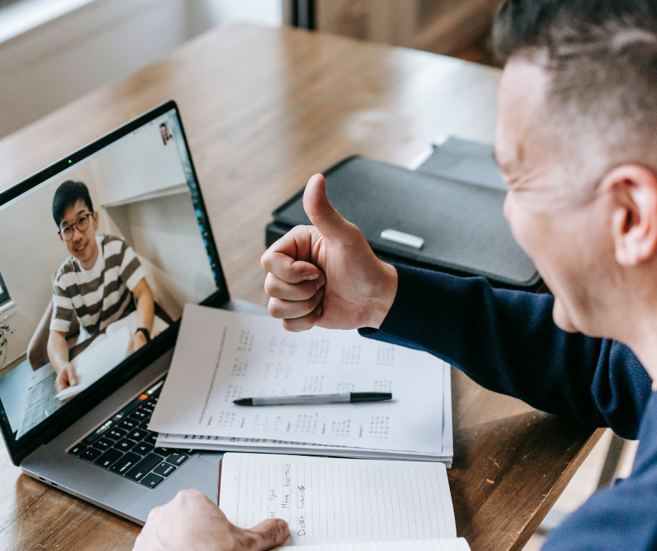 Mentor on video call with graduate