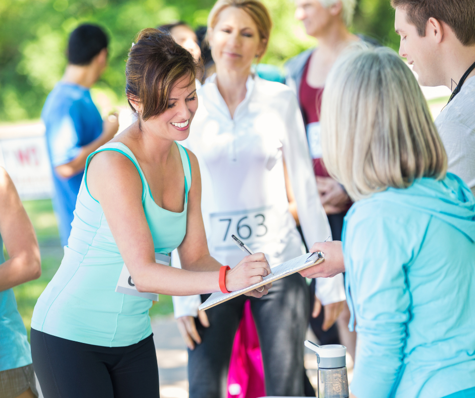 People signing up to a race