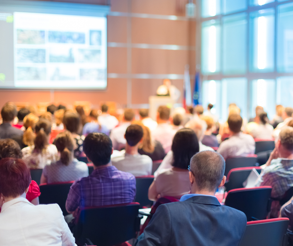 Audience sat at an event