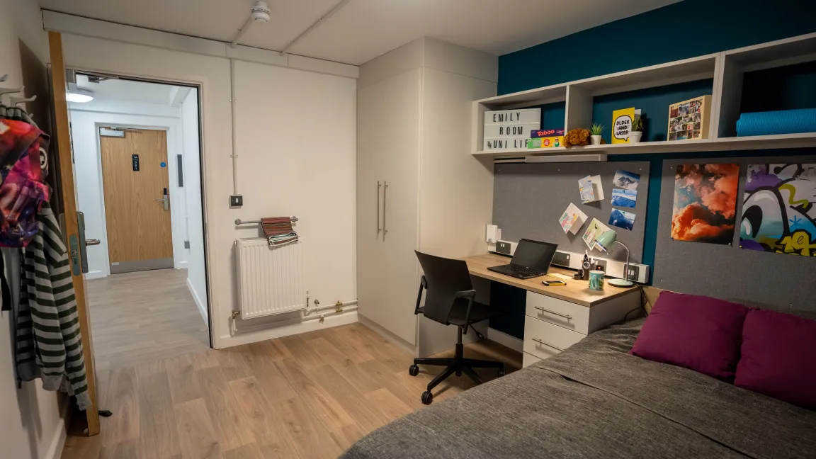 Student accommodation bedroom and hallway