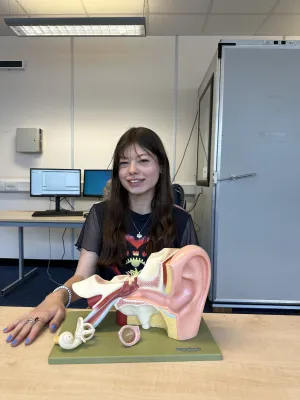 Isabel McGauley with a model of the inner ear