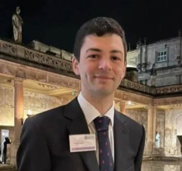 Head and shoulders portrait image of Joseph Futter smiling at the camera.