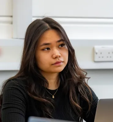 Head and shoulders portrait image of Frances Juat, BA Philosophy and Politics student looking at the camera.