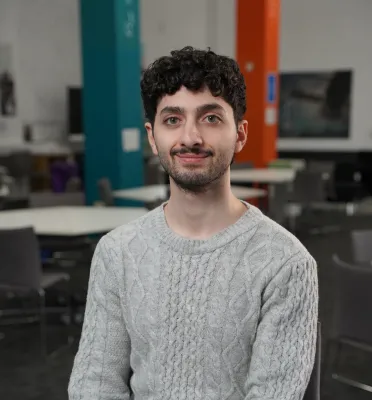 Portrait image of Feras Al Sahar, BSc Mathematics student, smiling at the camera.