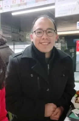 A portrait image of Caleb, an MSc Amputation and Prosthetic Rehabilitation student smiling at the camera.