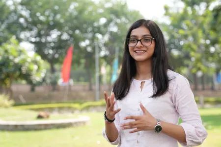 Saumya standing outside