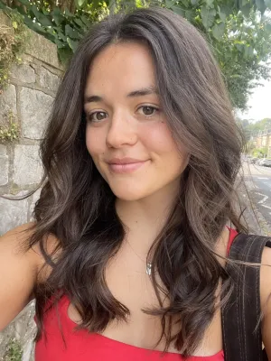 Portrait image of Kitty smiling at the camera