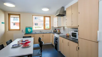 An empty, modern communal kitchen.