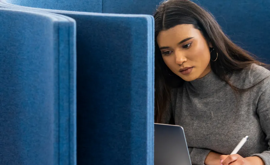 undergraduate European legal studies student studying in library