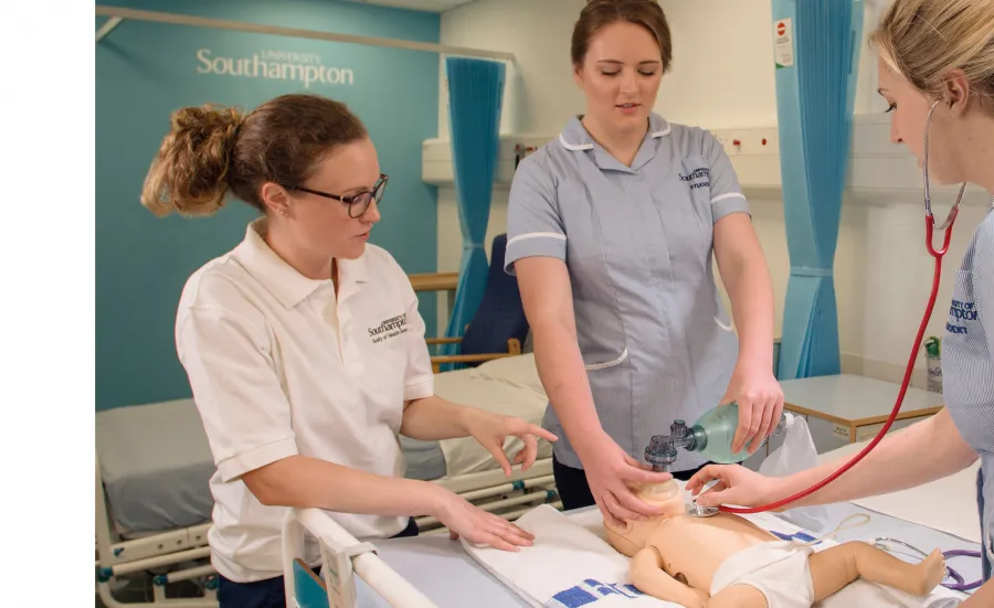 three midwifery undergraduate students with patient