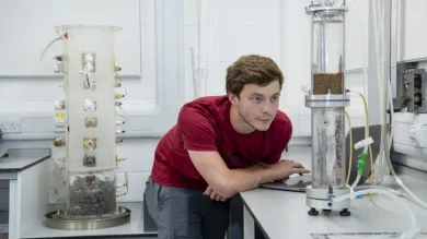 A student at work in the geomechanics laboratory