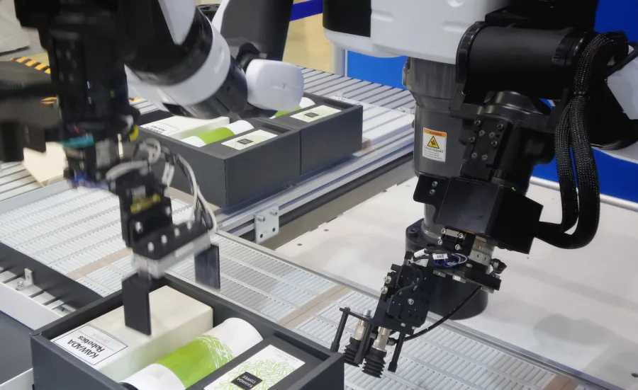 Robotic sensors packing products on a production line